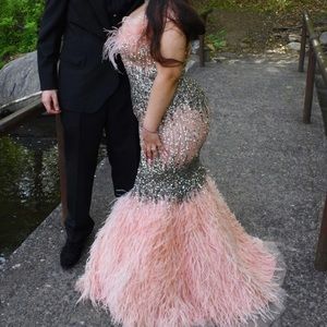 Worn once for only 2 hours to take Prom pictures.